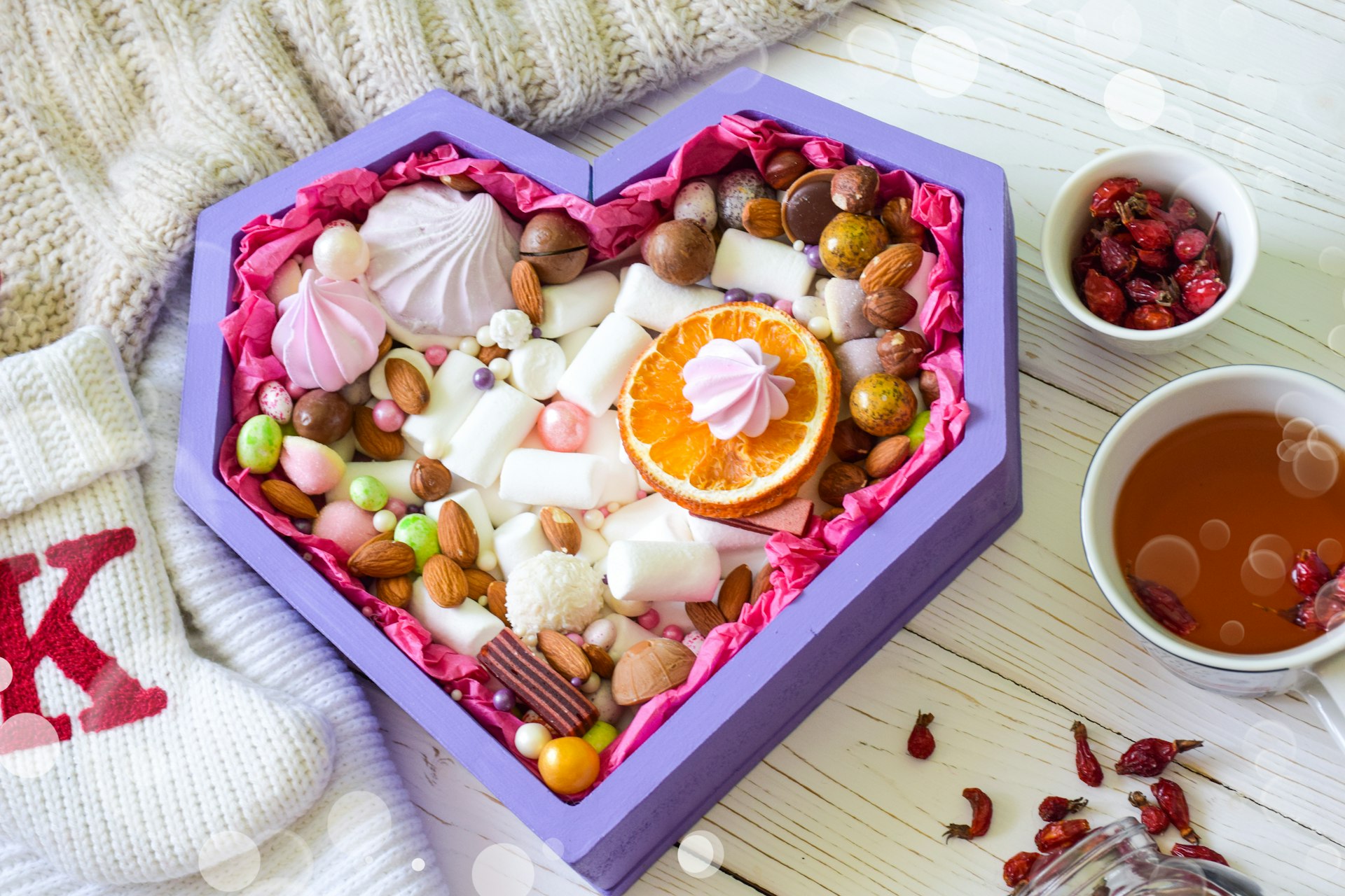 sliced fruits on pink plastic tray